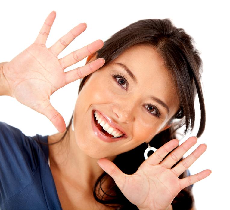 woman smiling after considering tooth replacement options high point