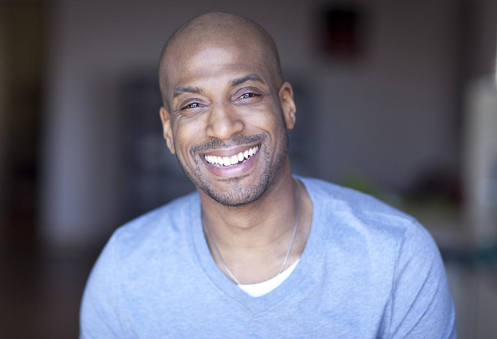 man smiling after full mouth reconstruction in high point nc