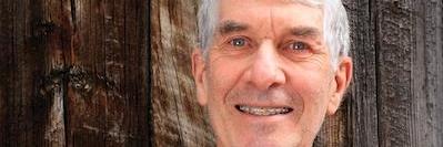 Man smiling with braces from Deep River Family & Cosmetic Dentistry,