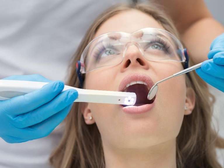 patient with intra-oral camera during dental exam high point, nc